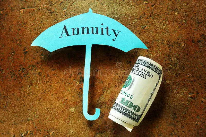 A blue umbrella with the word annuity on it next to a roll of money.